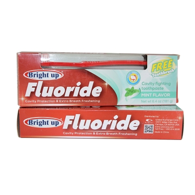  Fluoride toothpaste with free toothbrush 181g